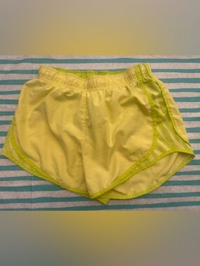 Nike Women’s small Green and Yellow dri fit Running Shorts